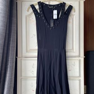 Kiwi Tucker black dress